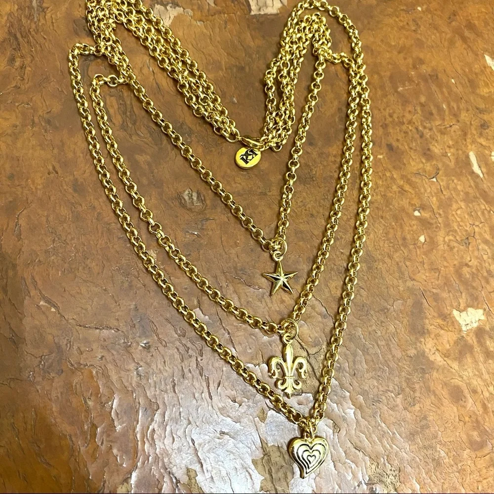 Beautiful three strand petite charm necklace